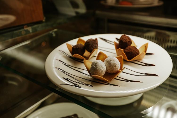 Assorted crafted truffles photo Assorted crafted truffles image